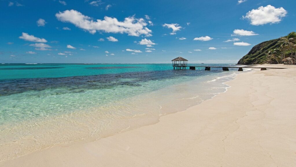 Secluded tropical beach on Petit St. Vincent